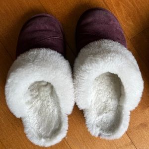 Well worn women’s slippers